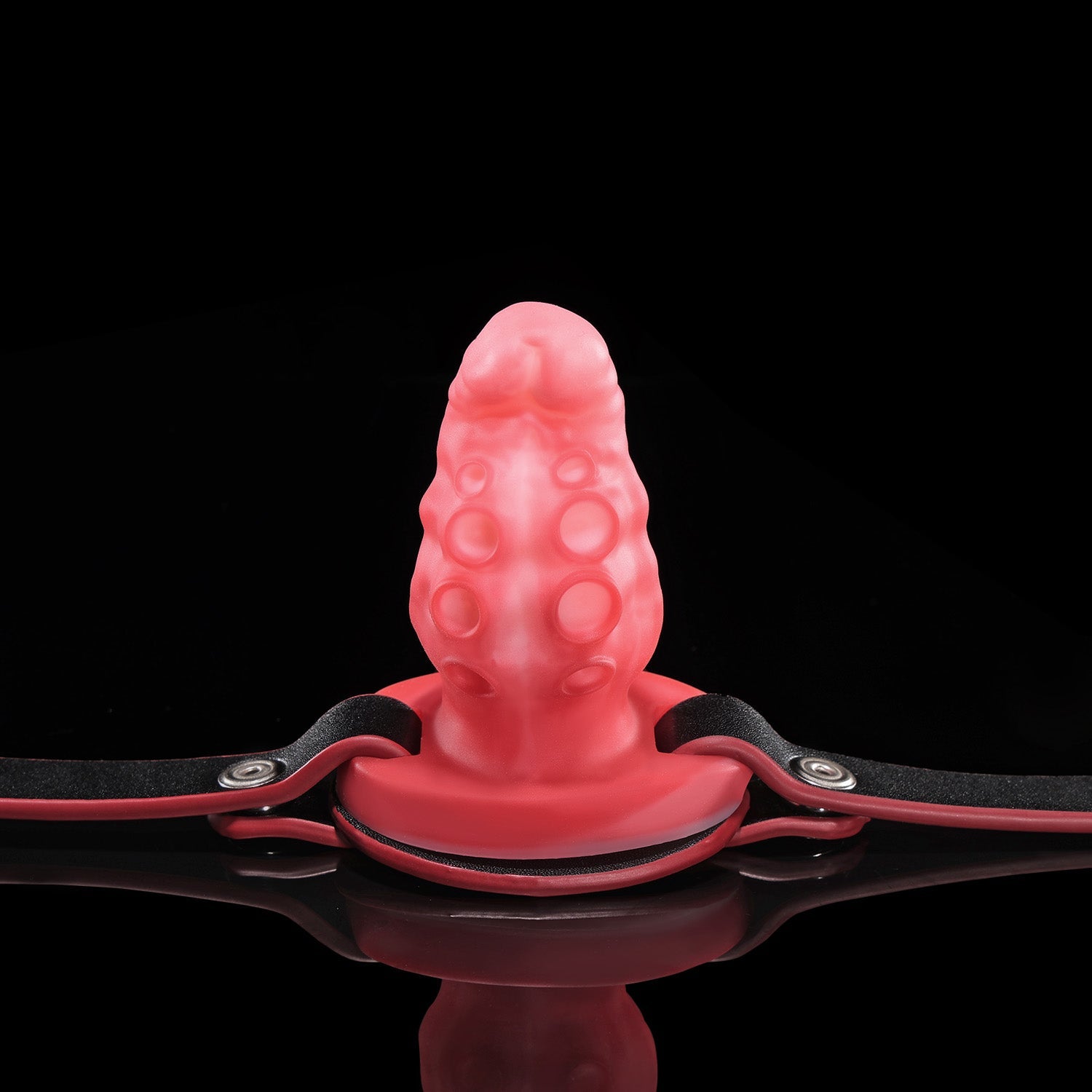 Nothosaur ALLA GAG tentacle mouth gag in pink silicone with adjustable black strap.