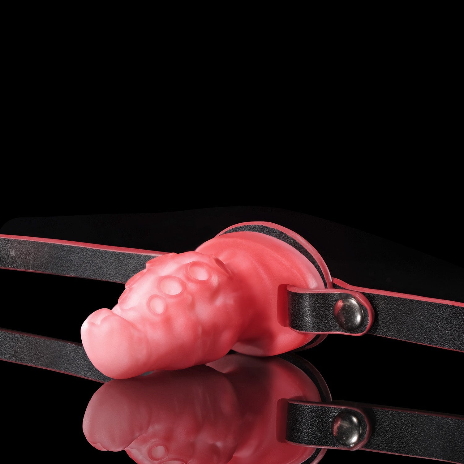 Nothosaur ALLA GAG tentacle mouth gag in pink silicone with adjustable black strap.